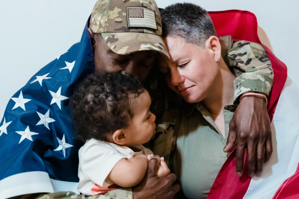 Service member reuniting with family